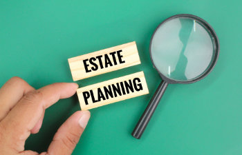magnifying glass with the word estate planning